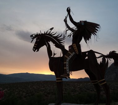 native sculpture at sunset in okanagan valley, british columbia, canada