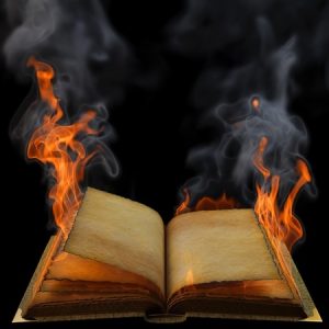 an open book on fire