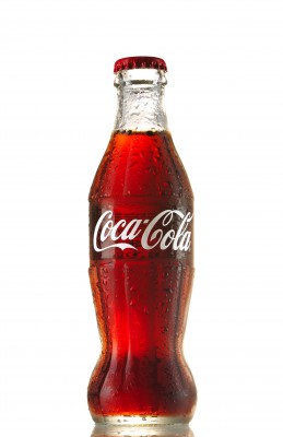 a glass bottle of Coca Cola