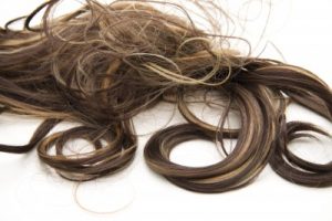 long strands of brown hair