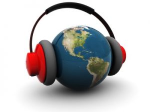 a globe of the earth with a set of headphones on it