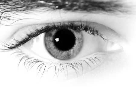 a black and white photo of an eye