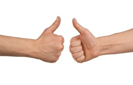 two hands doing a thumbs up