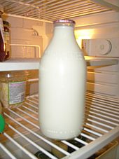 a glass bottle of milk
