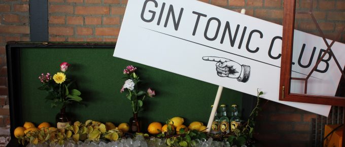 a sign that says gin tonic club