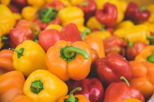 orange, yellow and red bell peppers