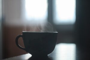 a steaming cup of hot coffee